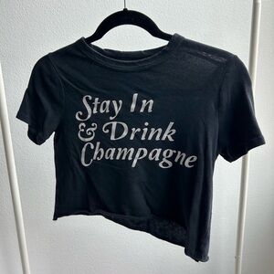 “stay in and drink champagne” cropped tshirt